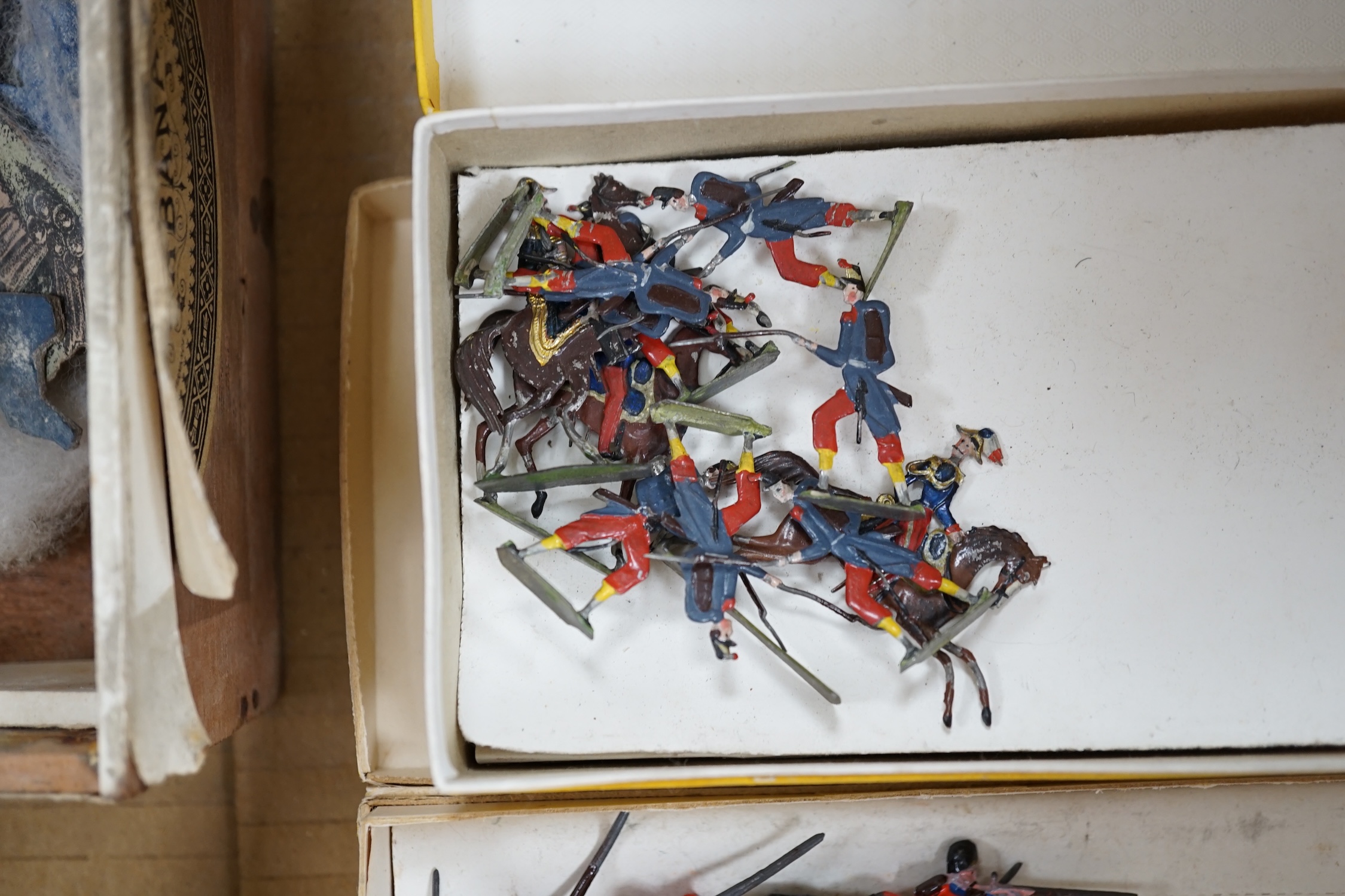 A collection of early 30mm German produced soldiers including 3d examples and flat/semi-flat examples, elephants, French infantry, Highlanders, etc.